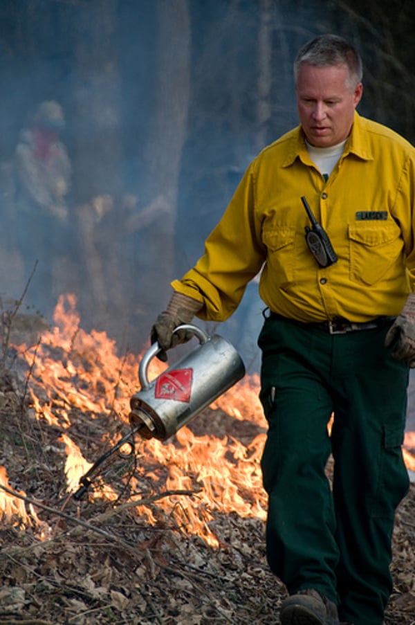 Dr. Kirk Larsen doing a prairie burn.