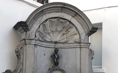 This is Manneken Pis! The 2 foot tall little boy is of the top tourist sights to see in Brussels.